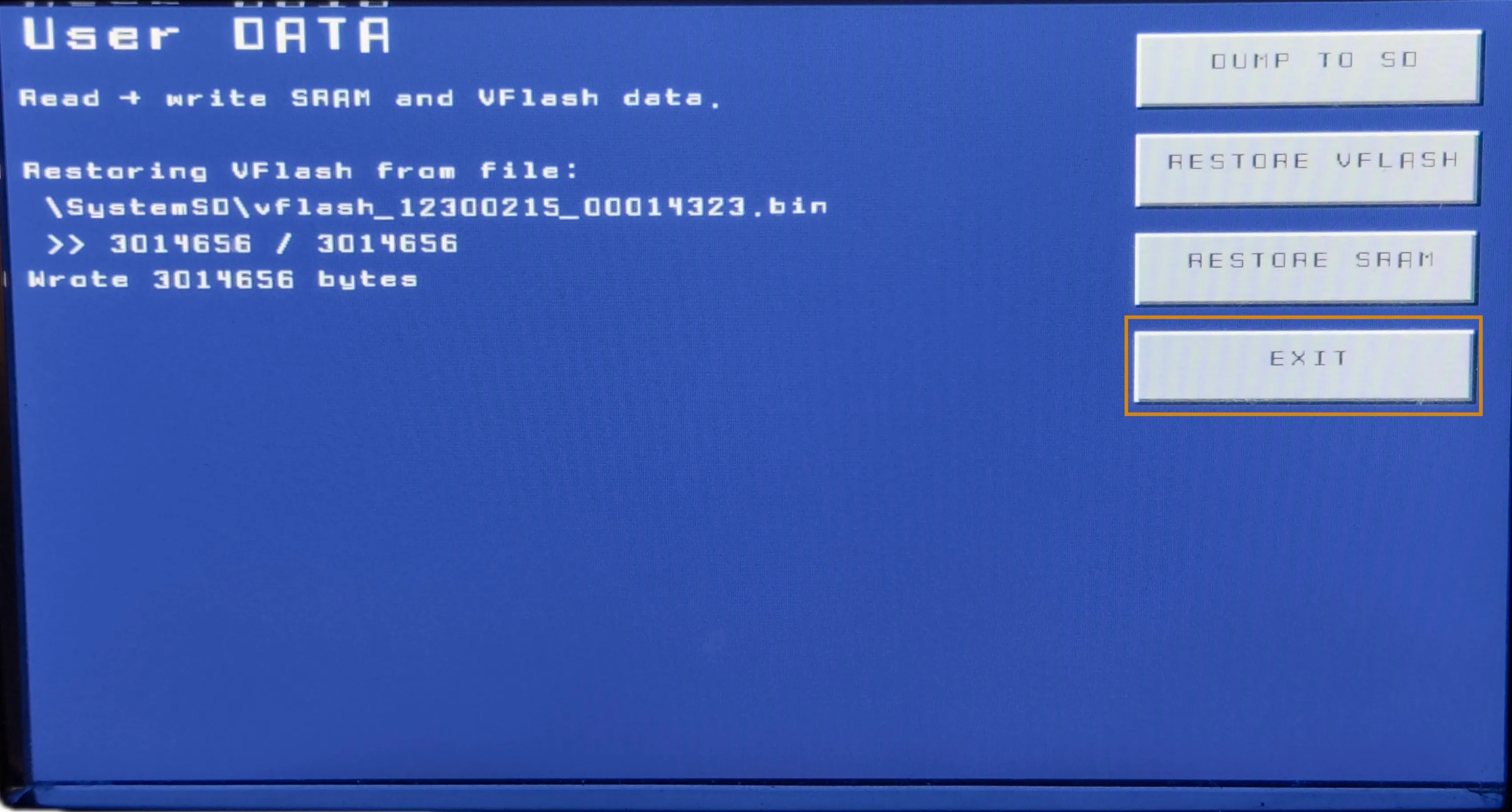 The restore completed screen with the EXIT button