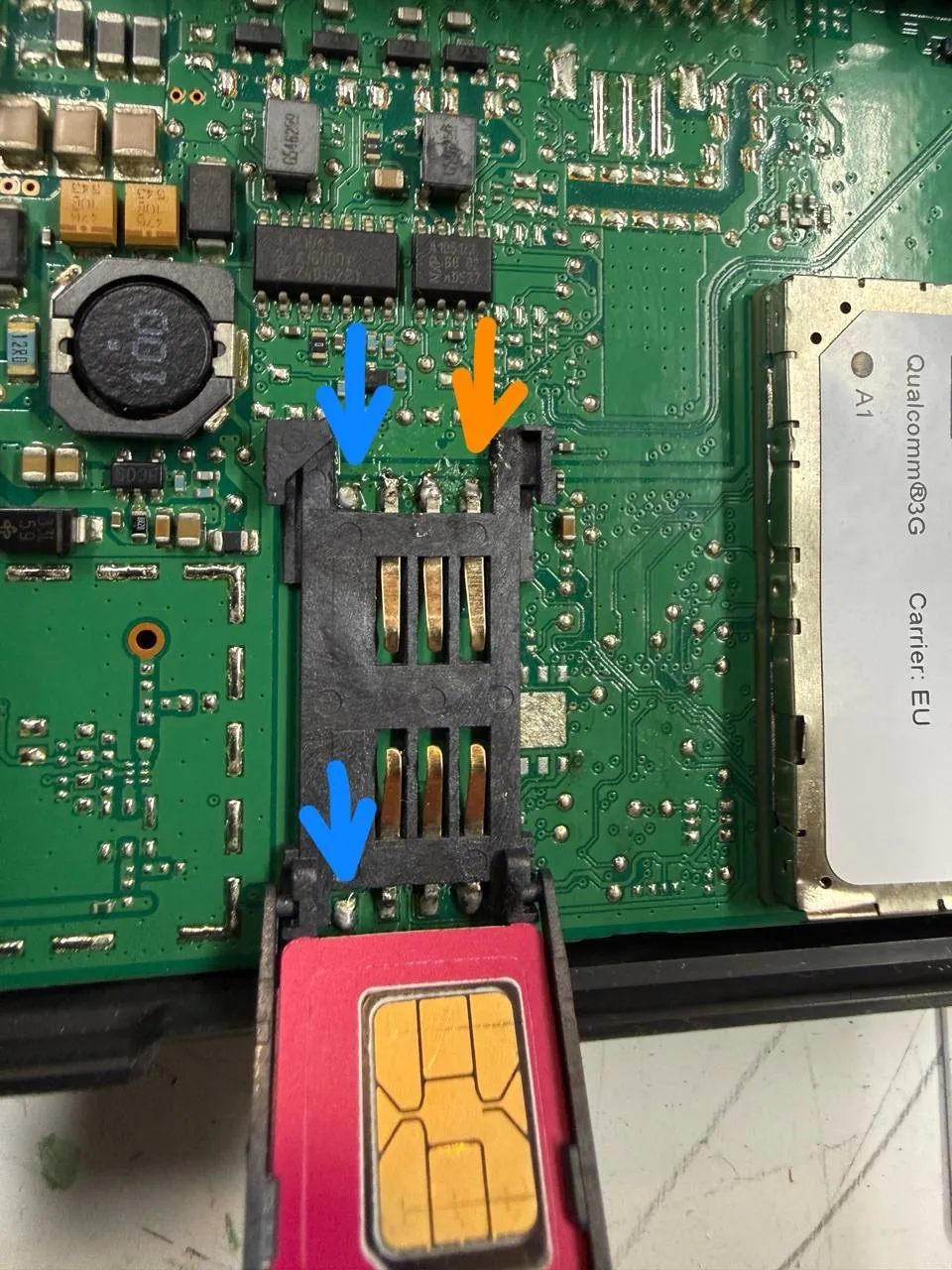 The SIM slot soldered on in the 3G orientation